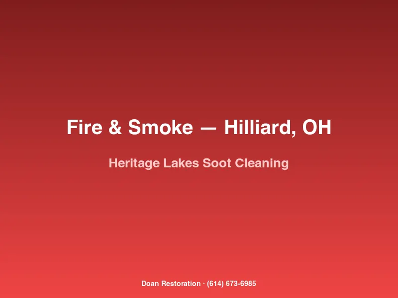 Doan Restoration technician cleaning soot from white kitchen cabinetry after a contained kitchen fire in a Heritage Lakes home in Hilliard, OH.