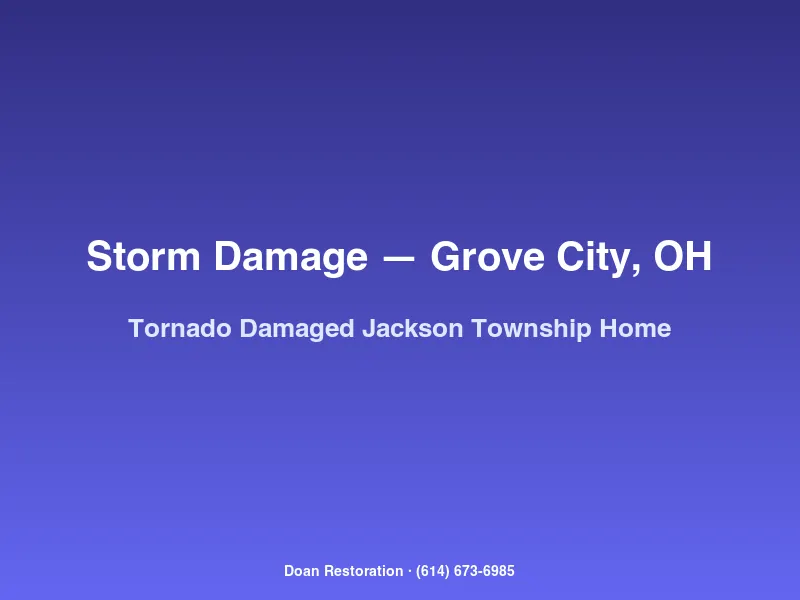Tornado-damaged single-family home in Jackson Township Grove City with torn roof and scattered debris across the yard